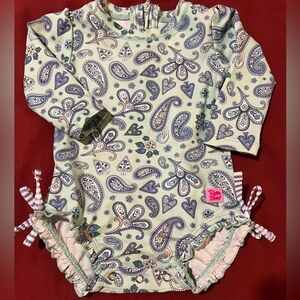 Ruffle butts rash guard swim suit EUC 6-12 months blue paisley